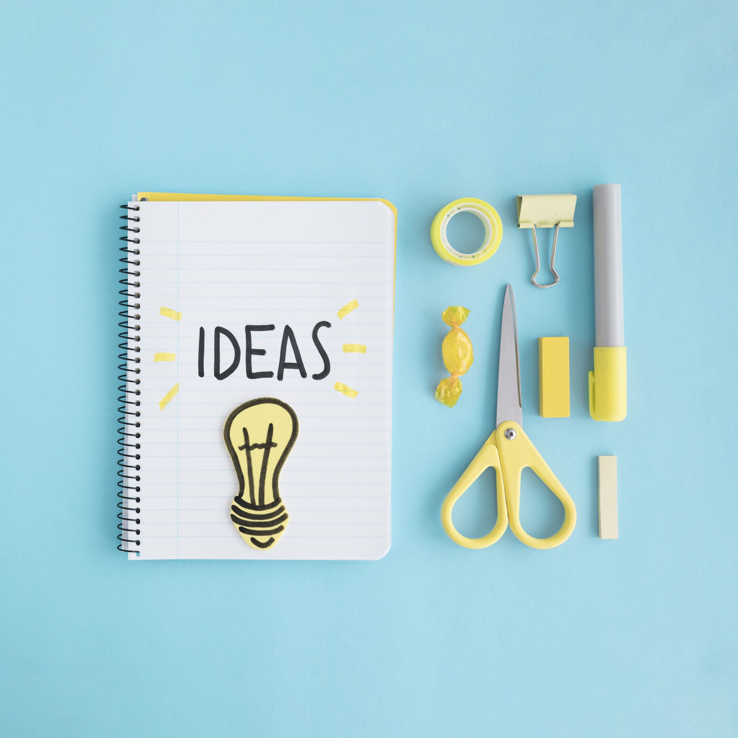 ideas-light-bulb-with-stationary-blue-background